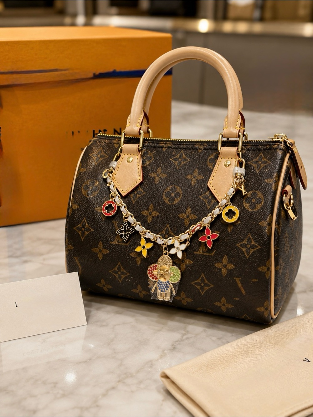 Gold keychain flower and Viviana